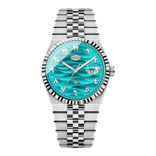 A wristwatch with a silver stainless steel link bracelet, fluted bezel, and a vibrant turquoise dial with a wave pattern and Arabic numerals.