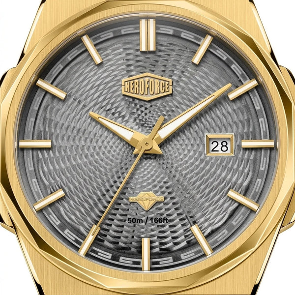 Upclose view of Gold-tone stainless steel watch with grey textured dial, date display, and integrated bracelet