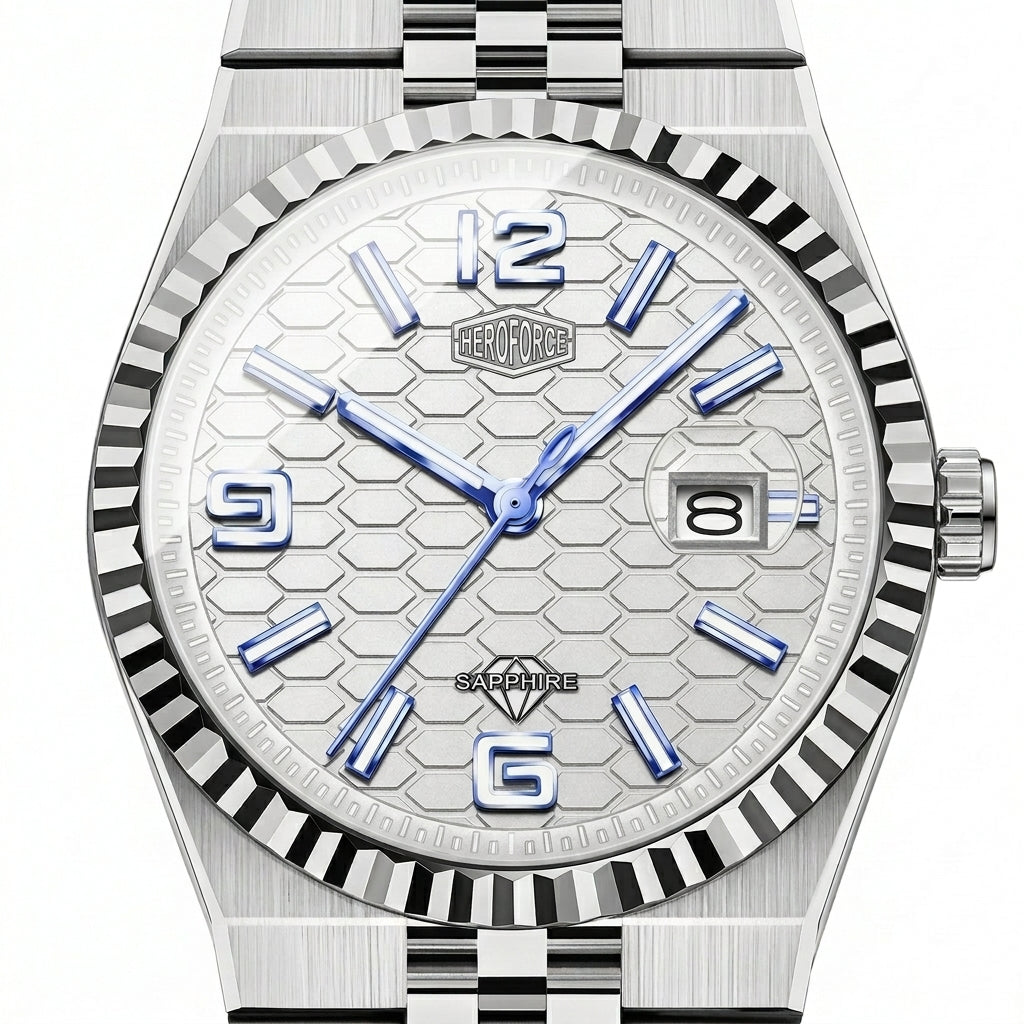 A HEROFORCE Sapphire watch with a silver-tone stainless steel case, a textured white dial with blue hands and markers, and a fluted bezel.