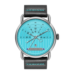 A HEROFORCE brand watch with a round silver-tone case, a light blue and white striped dial, and a black leather strap with bright turquoise stitching.