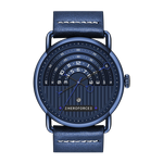 A blue leather strap watch with a round, multi-dial blue dial and a textured blue bezel, shown on a solid white background.