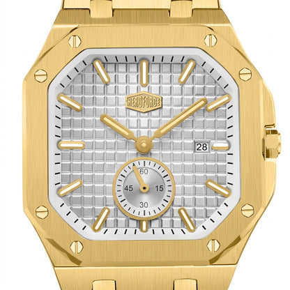 A close-up of a luxury watch with an octagonal gold-tone case, a textured silver white dial, gold-tone hands and hour markers