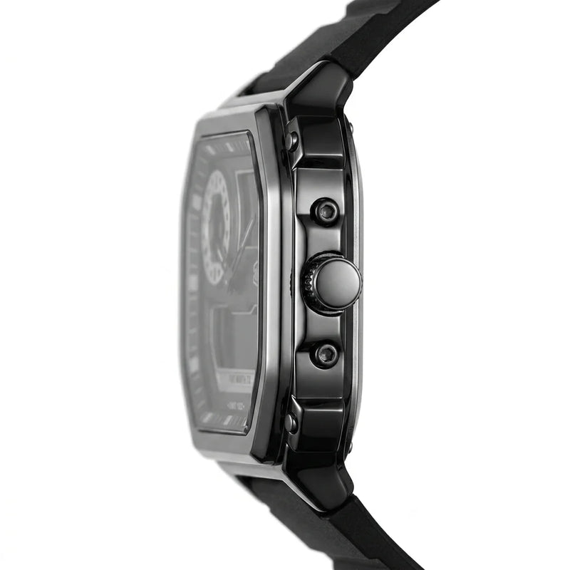 A close-up side profile of a modern analog watch with a black rubber strap, a metallic gunmetal gray case, and a dark dial, shown against a plain white background.