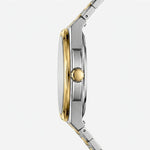 A close-up side profile of a two-tone stainless steel and gold watch with a matching metal link bracelet, set against a clean, light gray background.