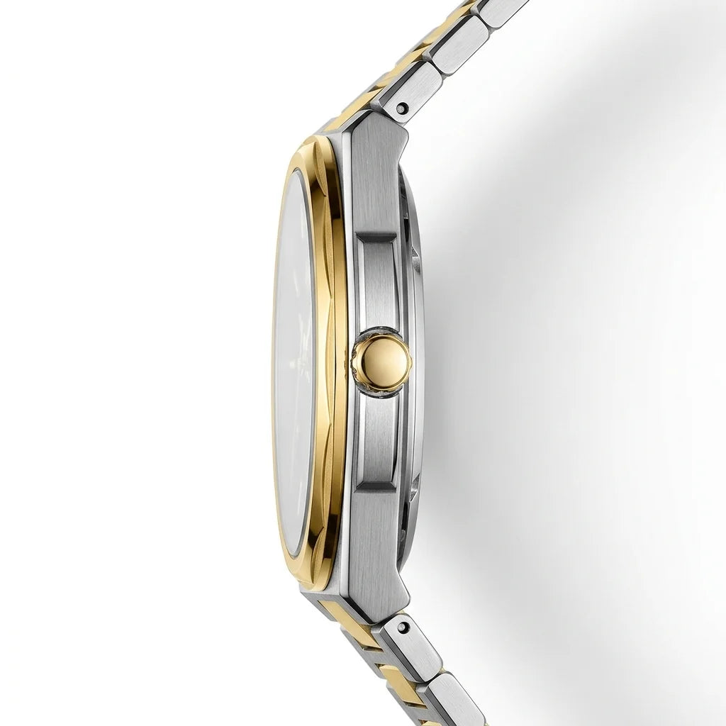 A close-up side profile of a two-tone stainless steel and gold watch with a silver dial and matching metal link bracelet, set against a clean white background.