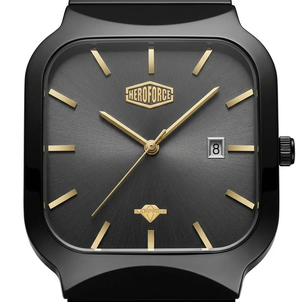 A close-up studio shot of a HEROFORCE wristwatch with a matte black case, a dark gray textured dial, and gold-tone hands, indices, and logo details.