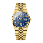 A gold-tone stainless steel watch with a textured blue dial, featuring a fluted bezel, gold-tone hour markers, and a matching gold-tone link bracelet.
