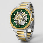 A luxury two-tone wristwatch with a green skeleton dial, gold and silver stainless steel case