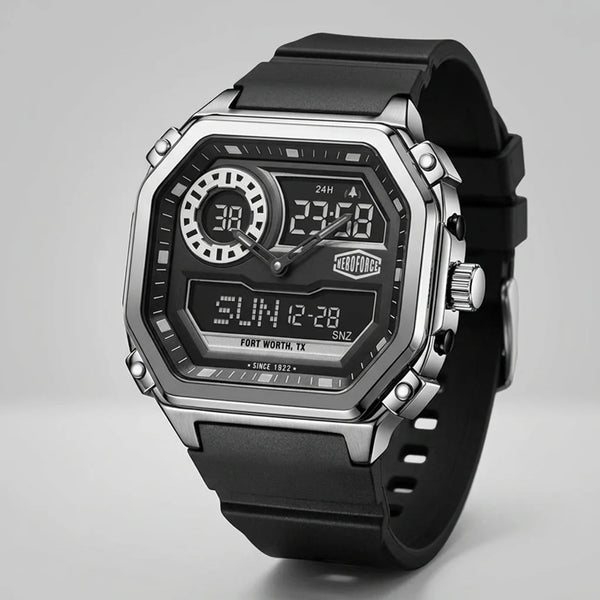 A rugged digital wrist watch with a black rubber strap, a silver-tone metal case, and a black face featuring analog hands, digital displays, and a visible HeroForce logo.