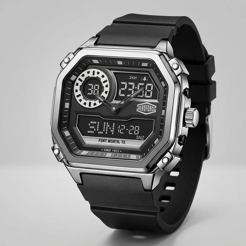 A rugged digital wrist watch with a black rubber strap, a silver-tone metal case, and a black face featuring analog hands, digital displays, and a visible HeroForce logo.