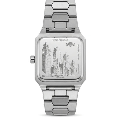 A silver stainless steel analog watch with a square case and a matching metal link bracelet, shown from the back