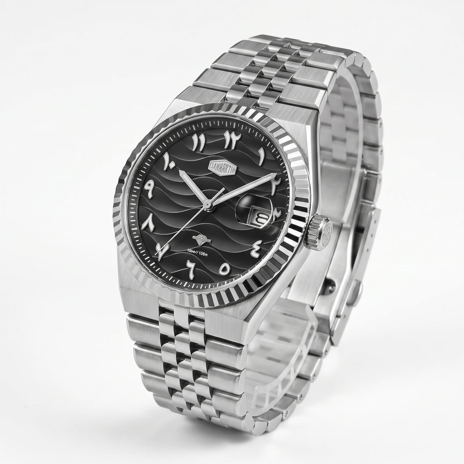 A stainless steel wrist watch with a fluted bezel, a black dial featuring a wave pattern, and a matching stainless steel link bracelet, shown on a light gray background.