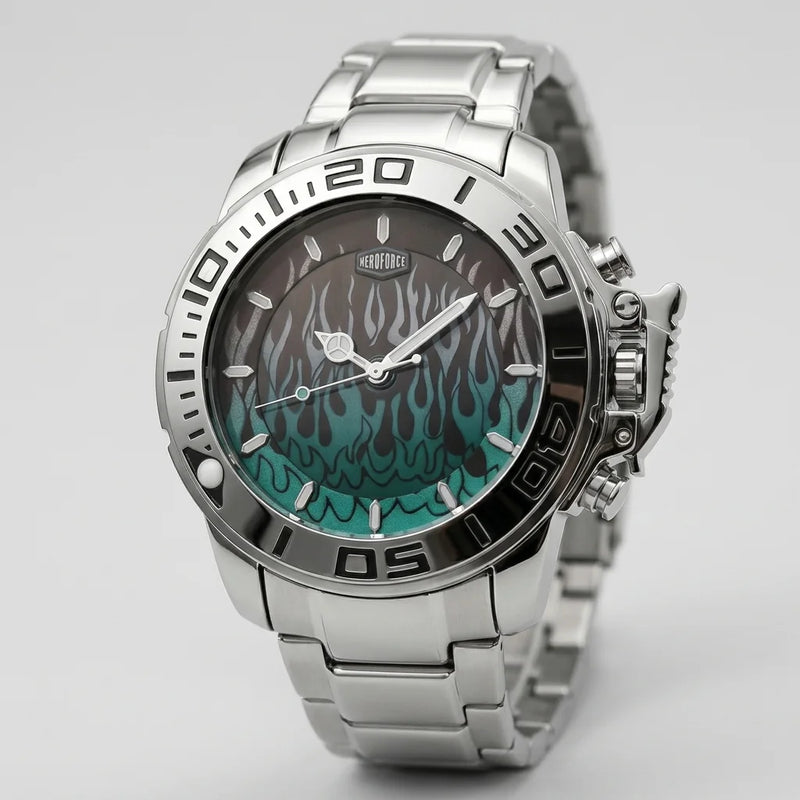 A stainless steel wristwatch with a silver-tone metal link bracelet, a black bezel with white numerals, and a dark dial featuring a teal and black flame pattern.