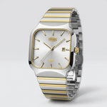 A two-tone stainless steel and gold wristwatch with a square bezel, silver dial, and matching metal link bracelet, shown on a light gray background.