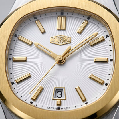 A two-tone stainless steel and yellow gold wristwatch with a white sunburst dial, featuring gold-tone hour markers, gold hands, and a date window at the 6 o'clock position.