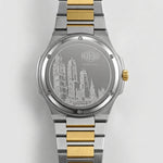 watch case back, engraved cityscape, two-tone bracelet