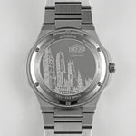 Back view - Stainless steel wristwatch with turquoise sunburst dial, silver markers, and small seconds subdial