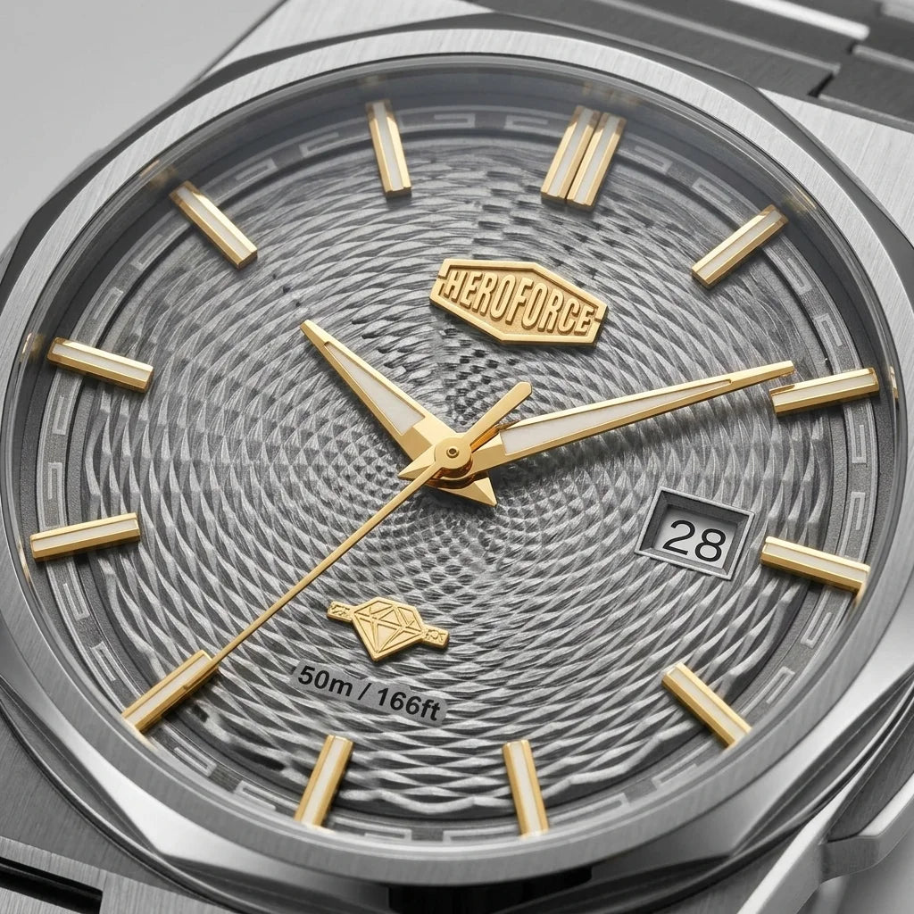 Close-up of a HEROFORCE men's watch featuring a textured gray dial, gold-tone hands and hour markers, and a silver-tone stainless steel case.