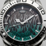 Close-up of a wristwatch dial and bezel with a silver stainless steel case, black outer ring, and a dark dial featuring a teal-to-black flame pattern. The brand name HEROFORCE is visible above the 12 o'clock mark.