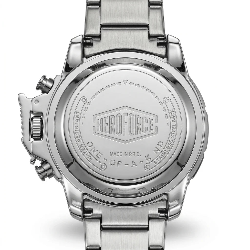 Close-up of the back of a stainless steel wristwatch with a metal link band, showing engraved branding and text on the case back.