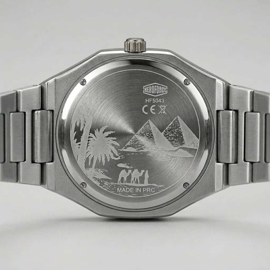 Close-up of the back of a stainless steel wristwatch with a metal link bracelet. 