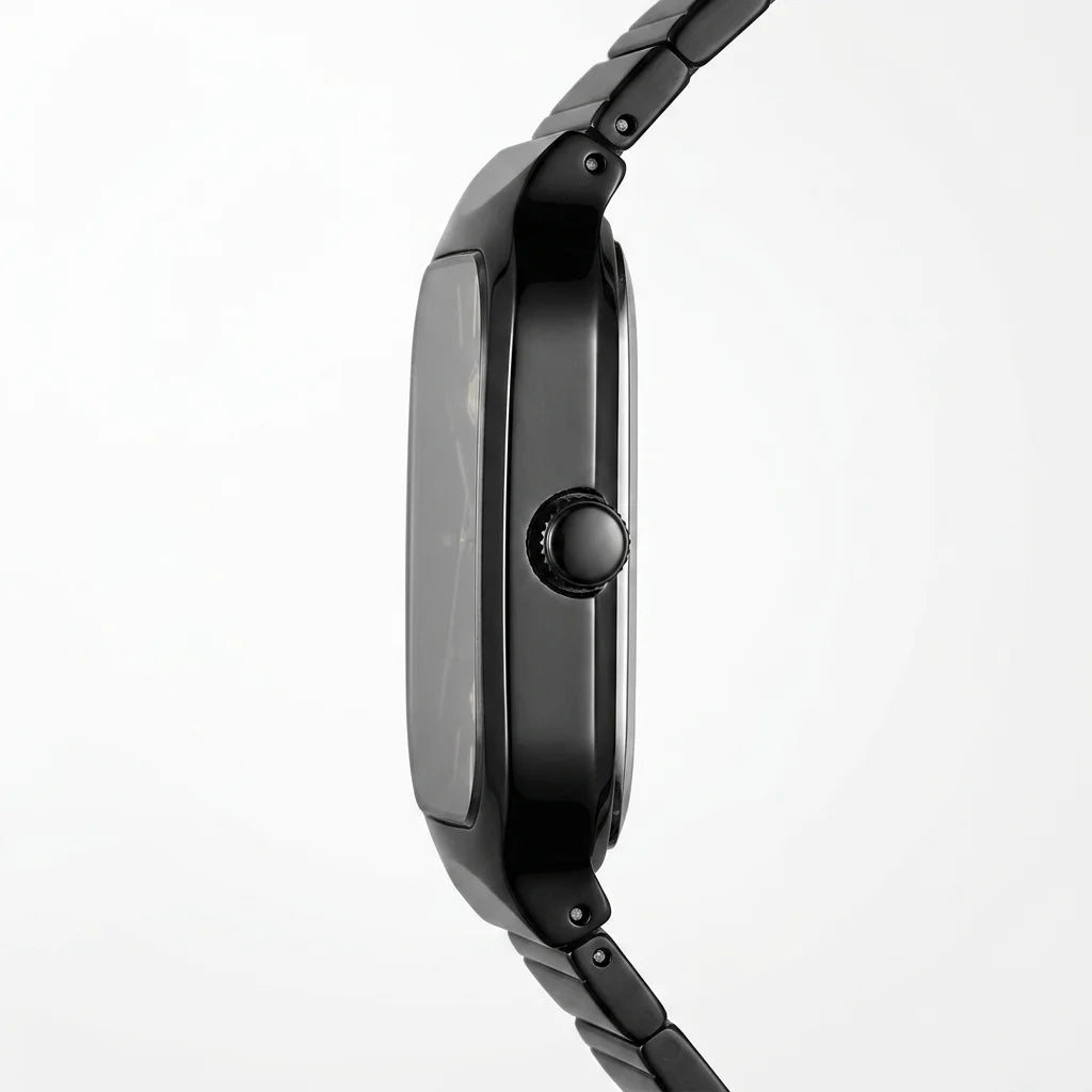 Close-up side profile of a black smartwatch with a glossy rectangular face and matching black metal link band, shown against a clean white background.