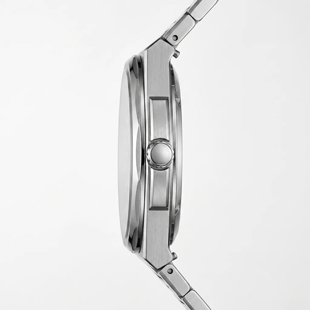 Close-up side profile of a stainless steel watch with a matching metal link band, showing the case, crown, and part of the bracelet on a light gray background.