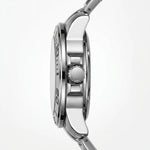 Close-up side profile of a stainless steel wristwatch with a polished silver-tone case, visible crown, and part of the bracelet on a clean white background.