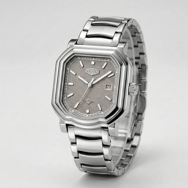 Full frontal view - Silver wristwatch with octagonal rectangular case, metallic bracelet, gray textured dial, silver markers, and date window