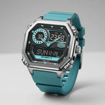 Full frontal view of Rectangular wristwatch with metallic case, turquoise strap, and geometric analog-digital face with turquoise accents.