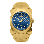 A gold-tone stainless steel watch with a textured blue carbon-fiber dial, featuring a date window at 3 o'clock, gold-tone hands and markers, and a segmented link bracelet.