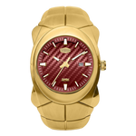 A gold-tone stainless steel watch with a textured red dial, featuring a date window, gold-tone hands, and a segmented link bracelet.