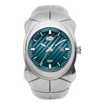 HEROFORCE 6039 - Silver stainless steel case and integrated bracelet, featuring a textured teal blue dial with a carbon fiber pattern.