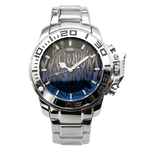 HEROFORCE silver wristwatch with metallic band, blue and black flame dial, rugged bezel with large numerals, silver hands and crown guards, bold artistic timepiece.