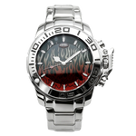 HEROFORCE silver wristwatch with metallic band, bold black and red flame dial, engraved bezel numerals, silver markers and hands, striking industrial design.
