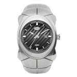 HEROFRCE 6039 - A silver-tone stainless steel wristwatch with a textured black carbon-fiber-pattern dial, silver-tone hands and markers, and a date window at 3 o'clock.