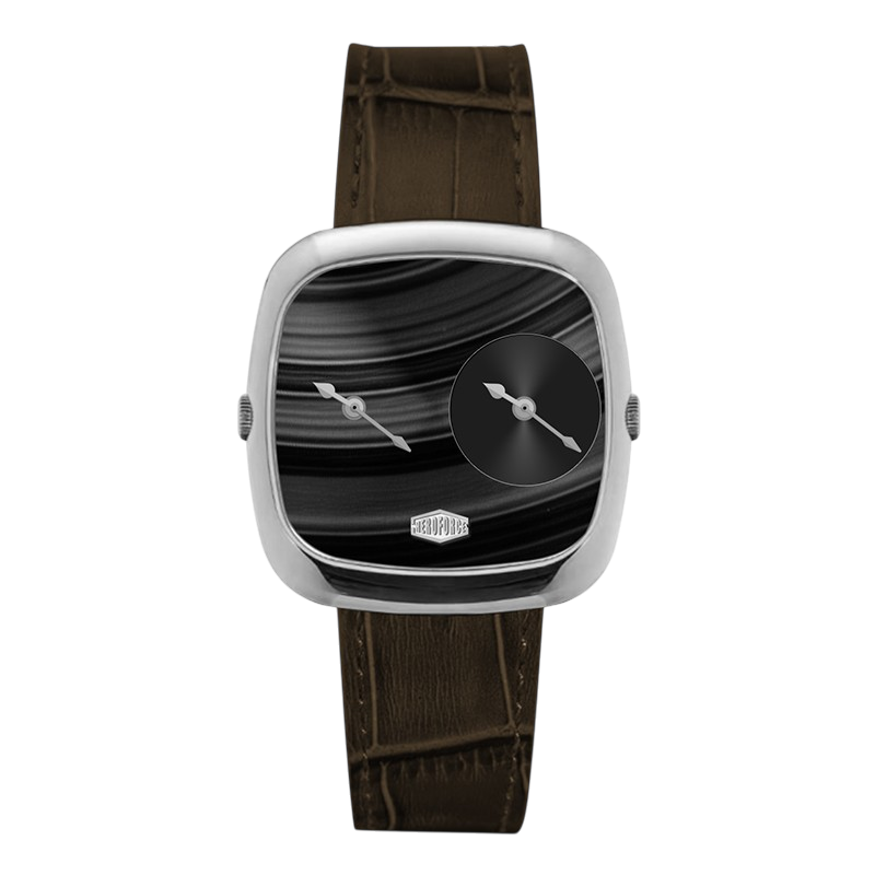 A modern square analog watch with a silver-toned case, a black marbled dial featuring a small black subdial, and a dark brown alligator-textured leather strap.