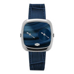 A modern square analog watch with a silver-toned case, a blue marbled dial featuring a smaller circular subdial, and a dark blue alligator-textured strap.