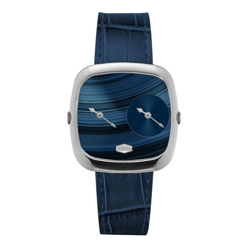 A modern square analog watch with a silver-toned case, a blue marbled dial featuring a smaller circular subdial, and a dark blue alligator-textured strap.