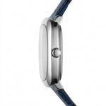 Close-up side profile of a smartwatch with a polished silver-tone case and a dark blue textured strap on a white background.