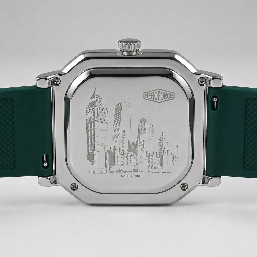 The back of a HeroForce watch with a silver-toned metal case and a dark green textured silicone strap, featuring an engraved city skyline design.