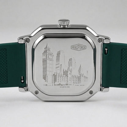 The back of a HeroForce watch with a silver-toned metal case and a dark green textured silicone strap, featuring an engraved city skyline design.