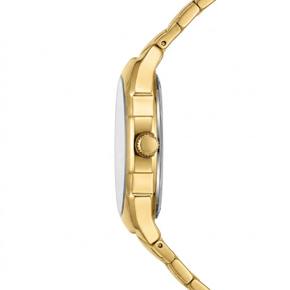 A close-up side profile of a gold-tone stainless steel watch with a matching link bracelet, featuring a fluted crown.