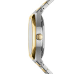Side profile of Round digital wristwatch with alternating silver and gold segmented band, gold bezel, and three gold side buttons