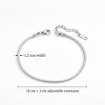 Silver snake chain bracelet with a lobster clasp and extension chain, shown on a white background with dimension labels indicating 1.2 mm width and 18 cm + 3 cm adjustable extension.