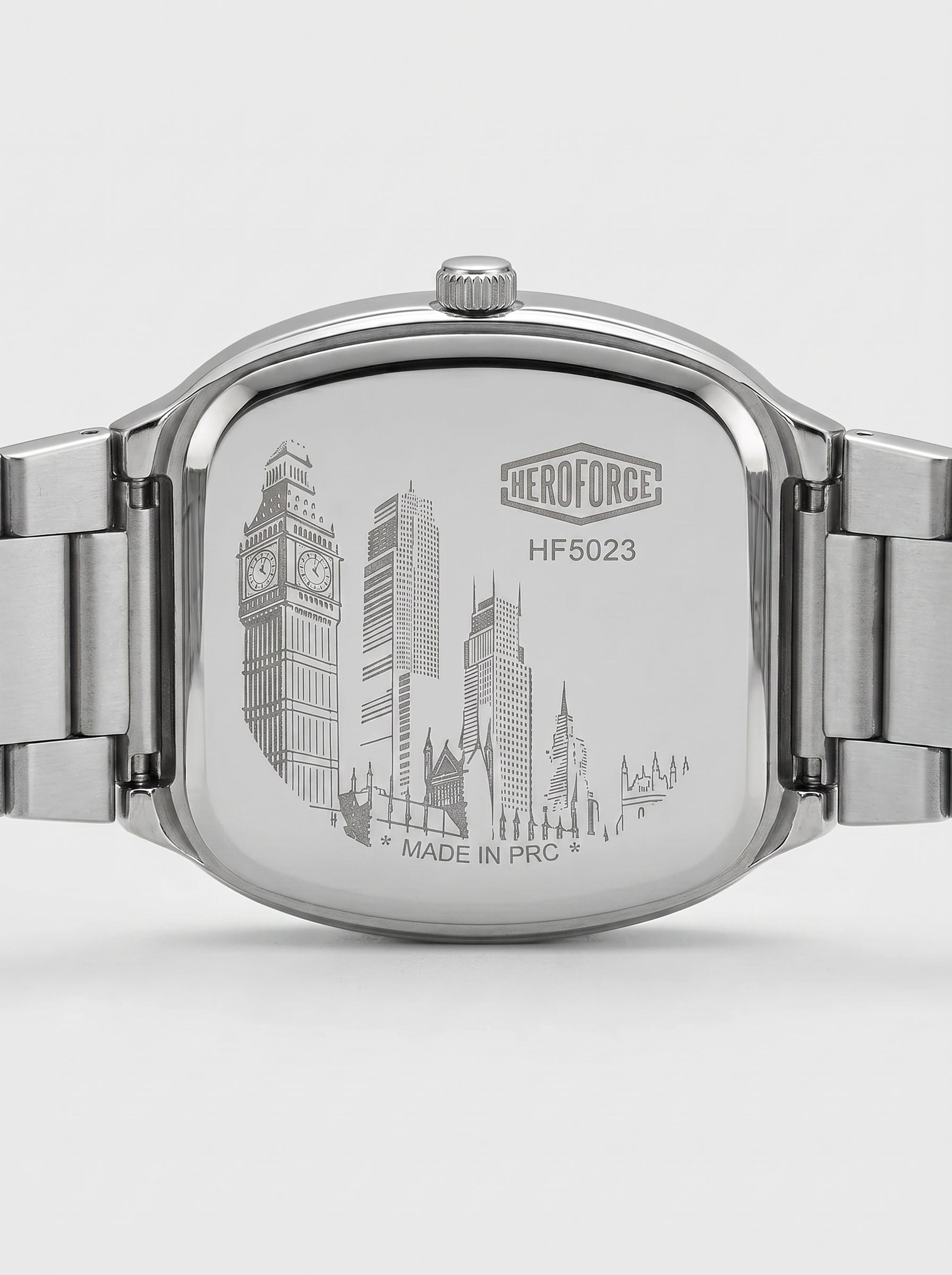 Silver stainless steel watch back with an engraved city skyline featuring Big Ben and London landmarks, with the HEROFORCE brand logo and model HF5023.