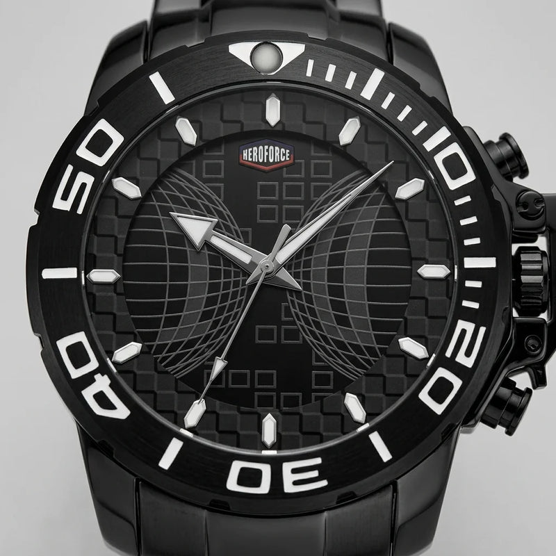 Upclose macro view of Black stainless steel watch with black geometric dial, oversized bezel, and metal bracelet