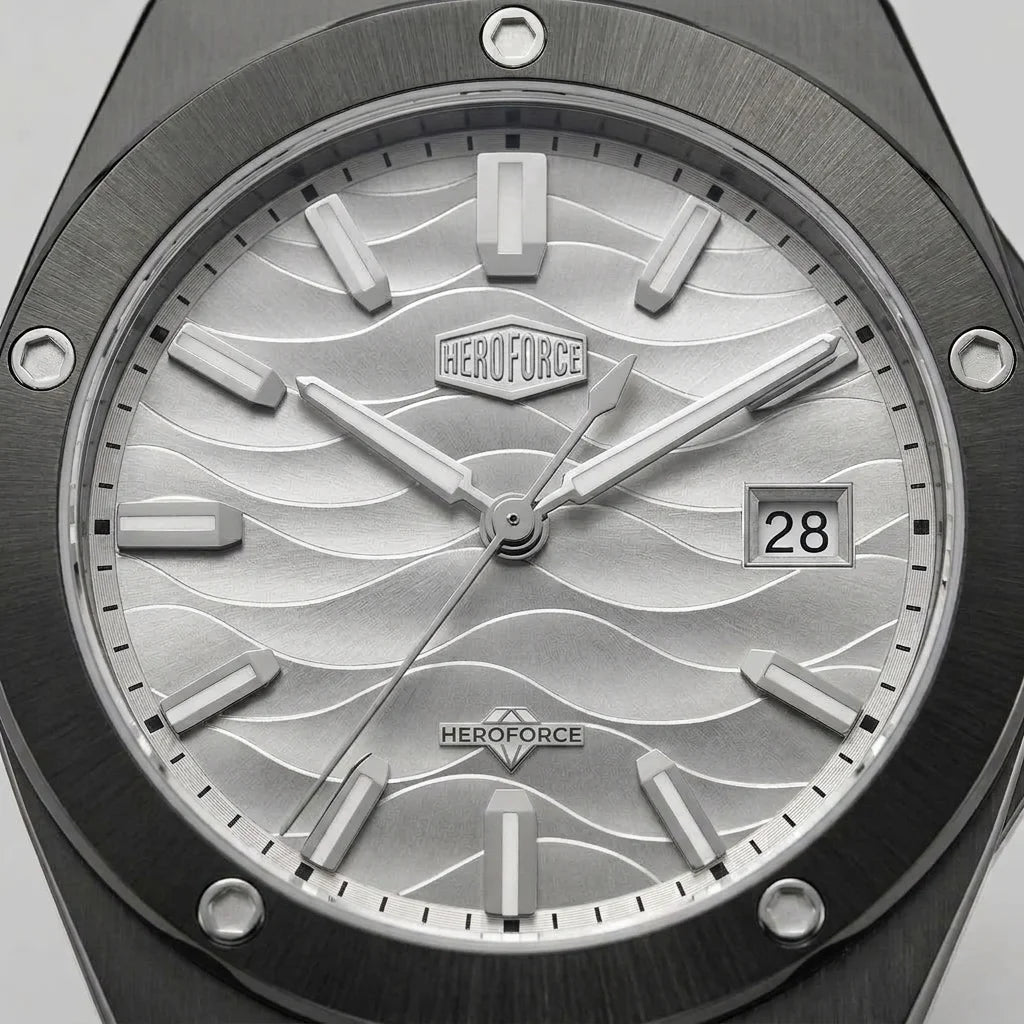Upclose view of A men's analog watch with a black metal case and link bracelet, featuring a silver dial with a wavy pattern, silver hour markers