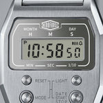 Upclose view of Silver digital wristwatch with rectangular face and segmented band, display showing brand “HEROFORCE,”
