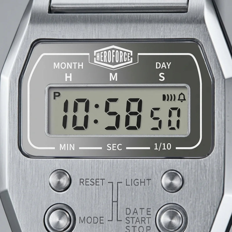 Upclose view of Silver digital wristwatch with rectangular face and segmented band, display showing brand “HEROFORCE,”